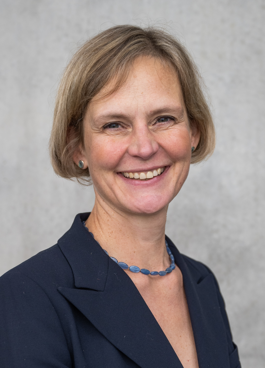 A person smiling at the camera
AI-generated content may be incorrect.